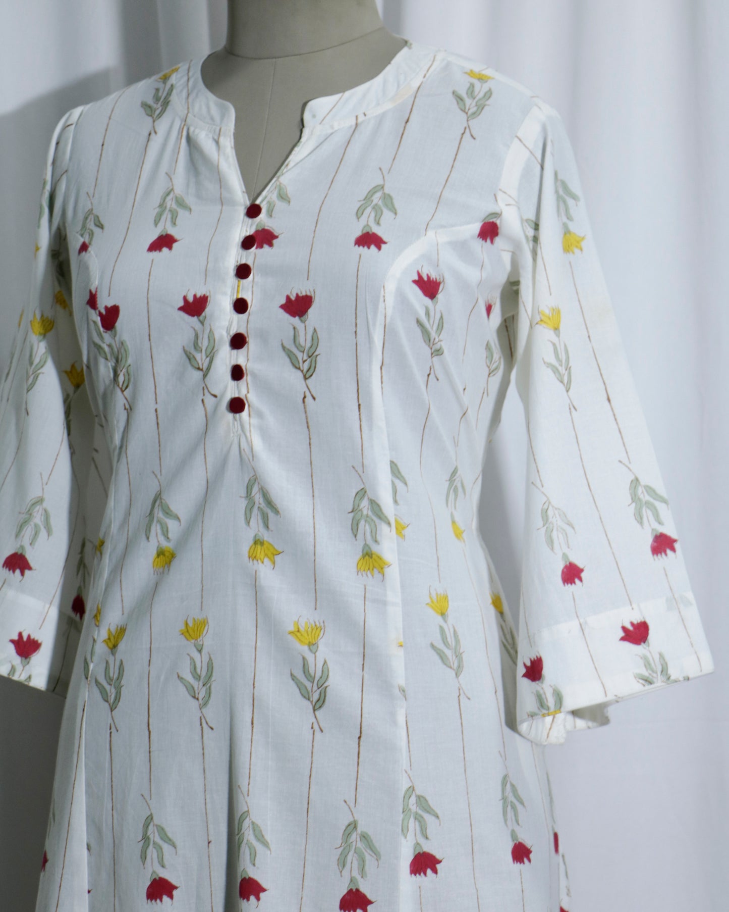 White Jaipuri Handprinted Cotton Dress with Rose Print & Potli Button Detailing
