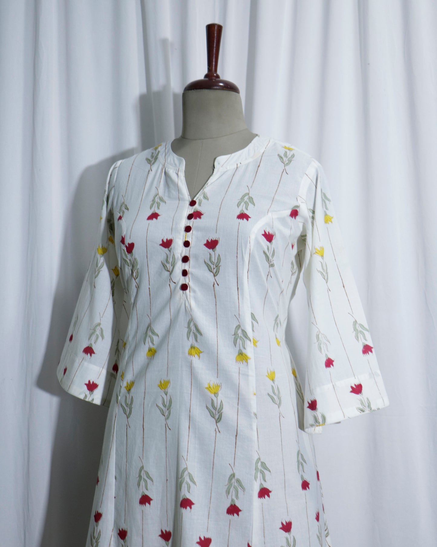 White Jaipuri Handprinted Cotton Dress with Rose Print & Potli Button Detailing