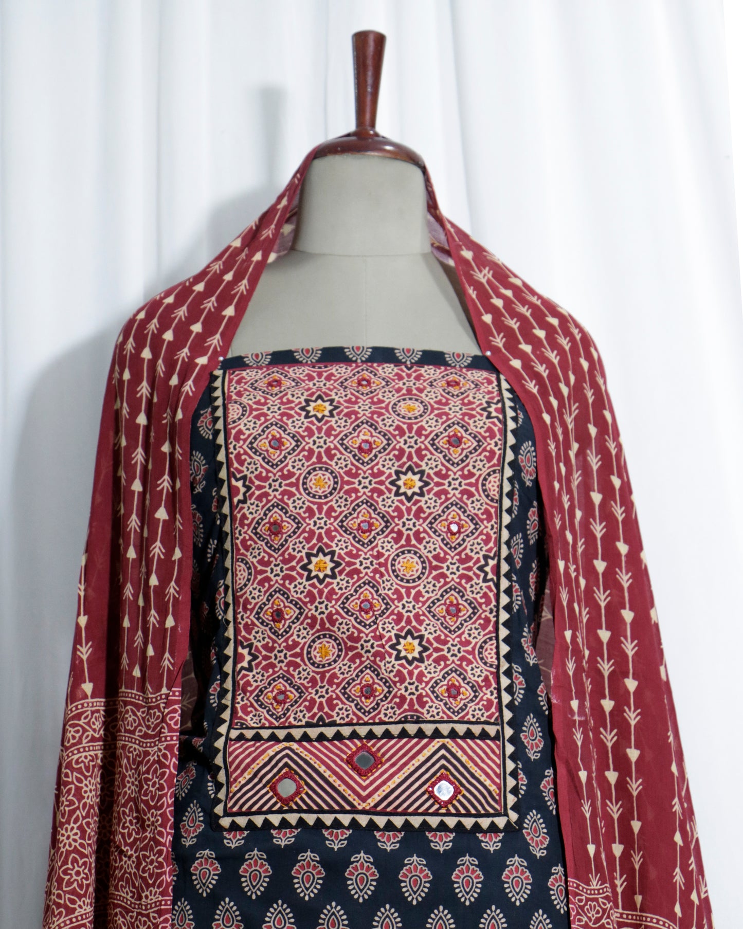Mirror worked Ajrakh Handprinted Maroon & Black cotton Suit set with mul-mul dupatta