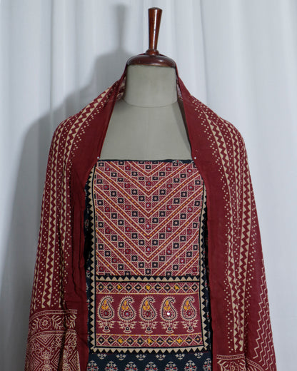 Mirror worked Ajrakh Handprinted cotton Suit set with mul-mul dupatta