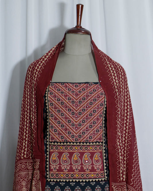 Mirror worked Ajrakh Handprinted cotton Suit set with mul-mul dupatta