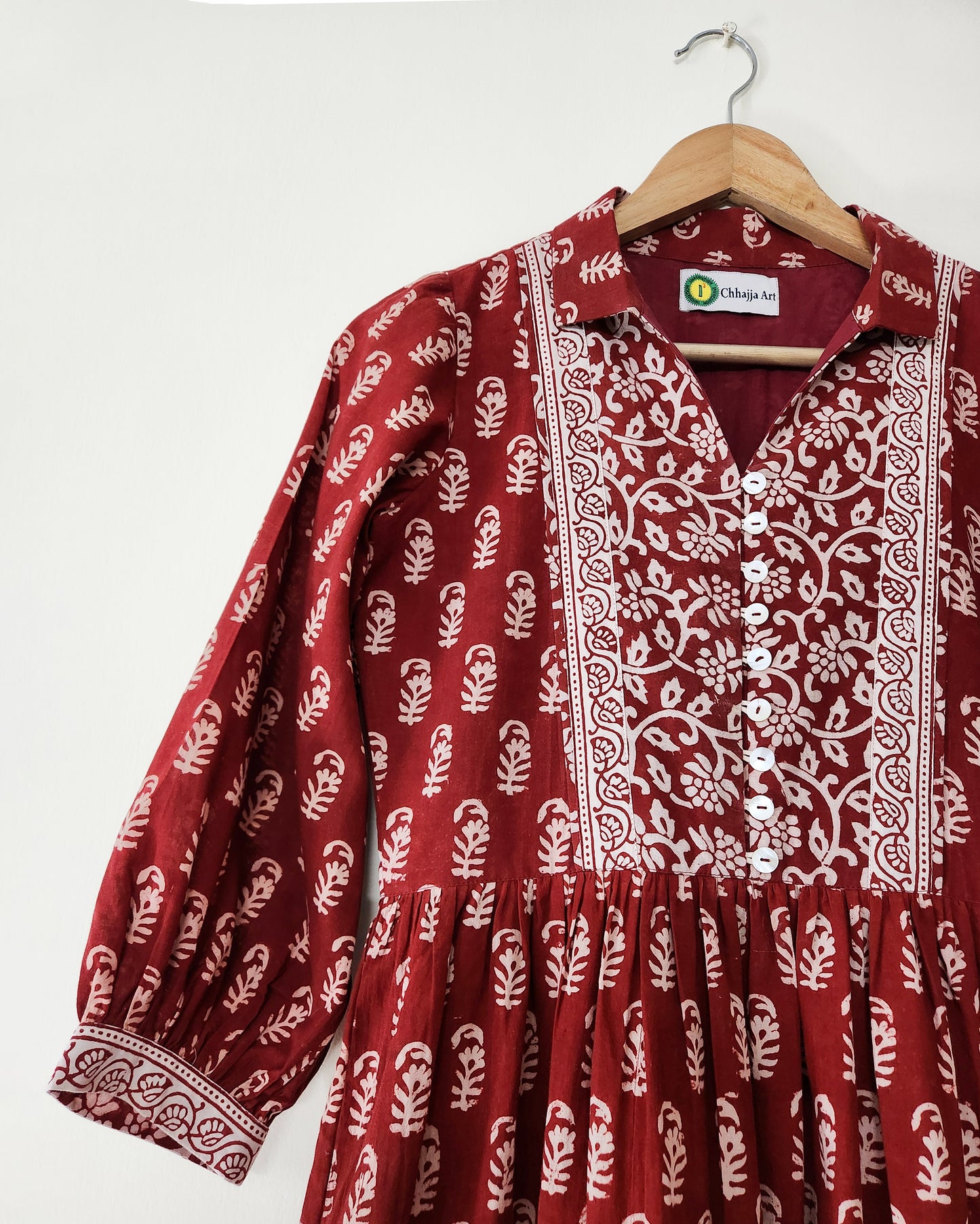 Gulbagh, rust-coloured layer dress made entirely of cotton Bagh print fabric
