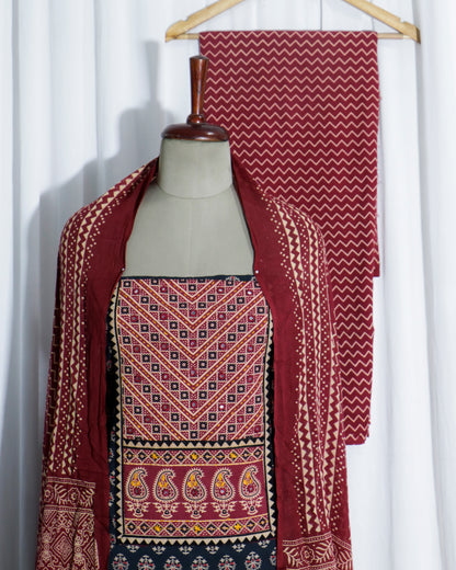 Mirror worked Ajrakh Handprinted cotton Suit set with mul-mul dupatta