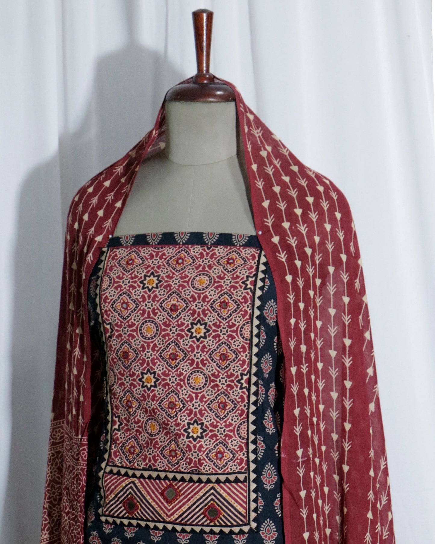 Mirror worked Ajrakh Handprinted Maroon & Black cotton Suit set with mul-mul dupatta