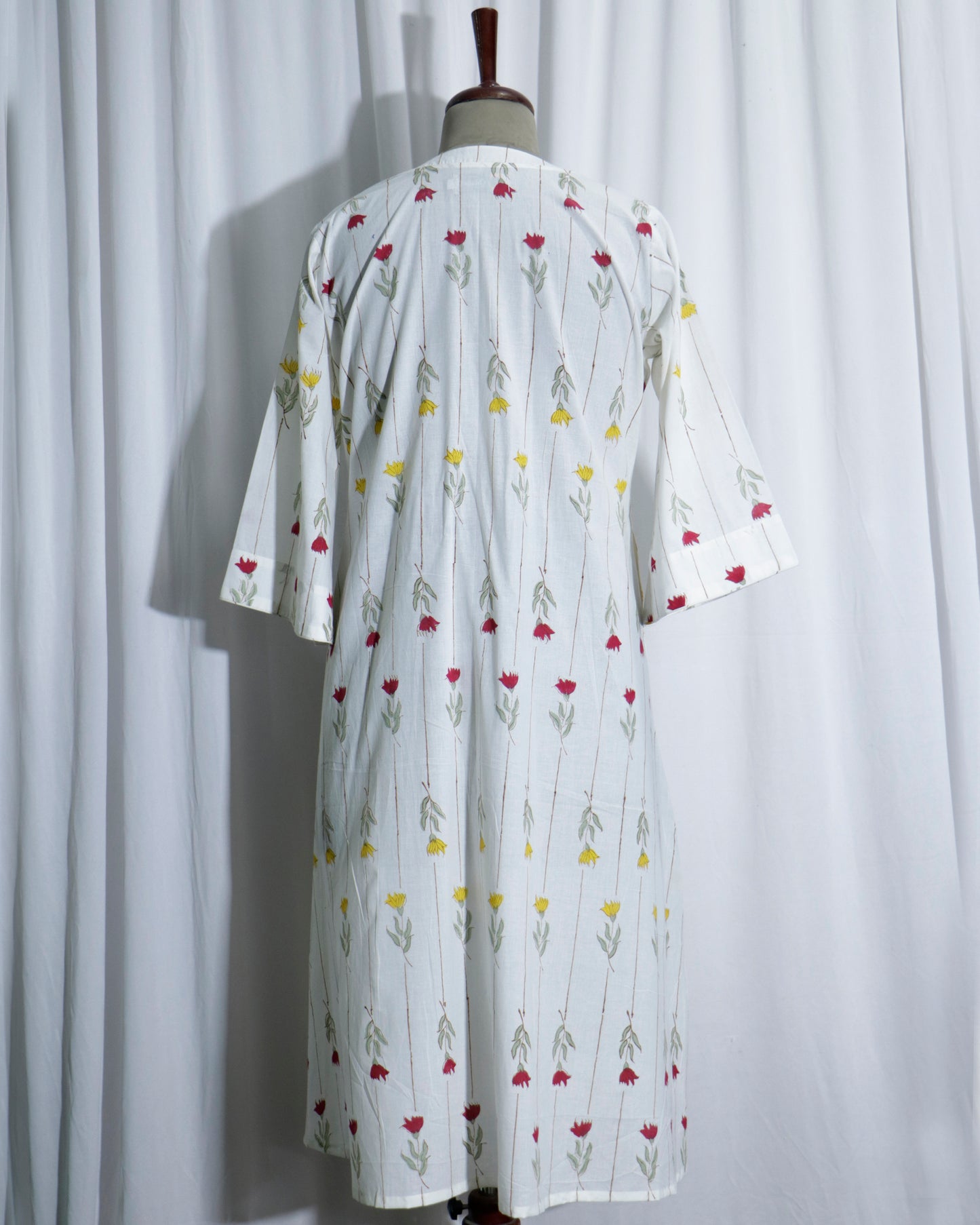 White Jaipuri Handprinted Cotton Dress with Rose Print & Potli Button Detailing