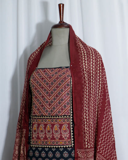 Mirror worked Ajrakh Handprinted cotton Suit set with mul-mul dupatta