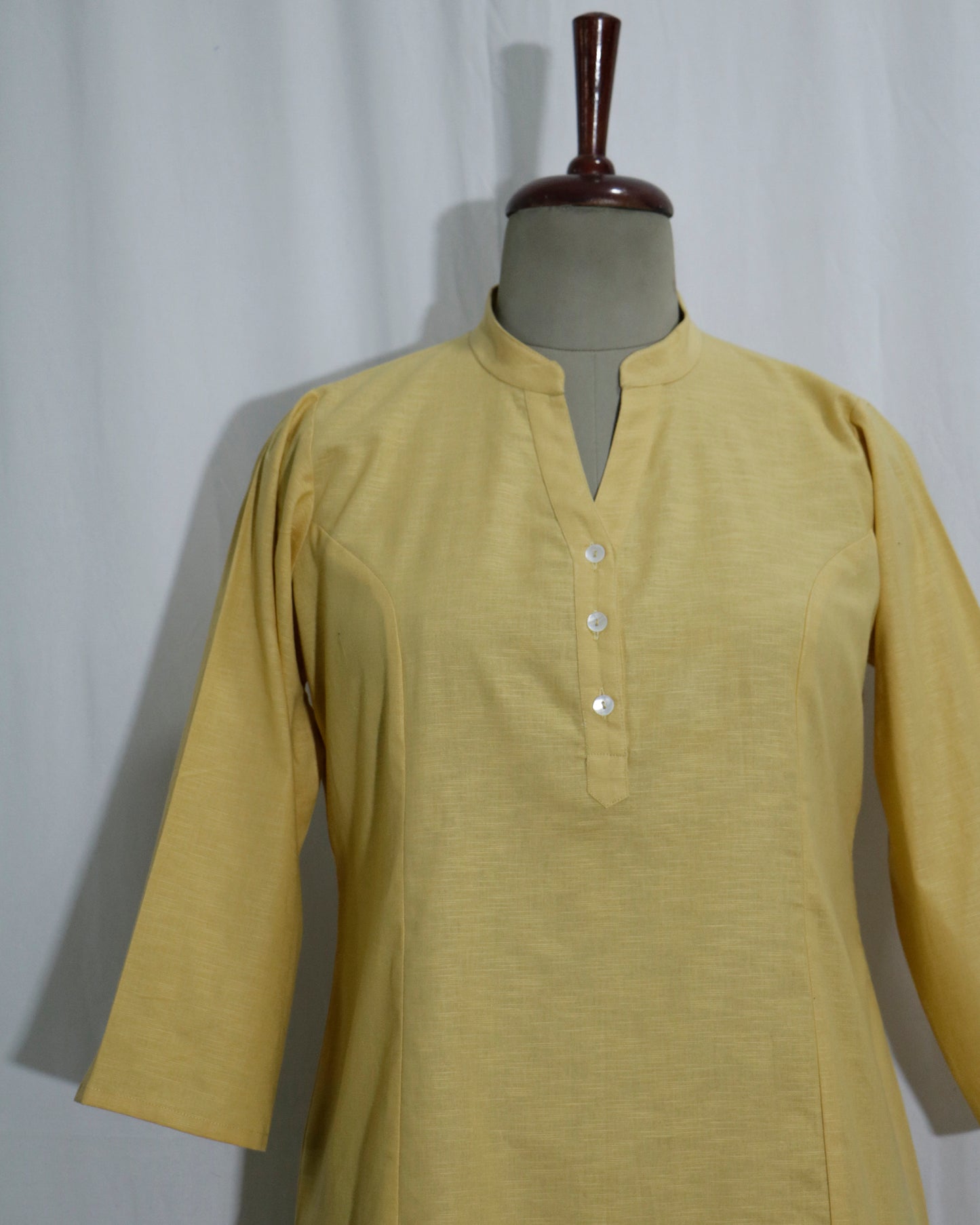 Lilen Beige Short Kurta with Kurta Patti & Shell Buttons